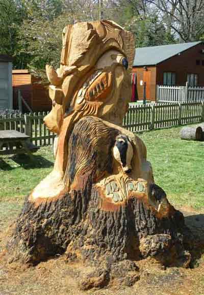 tree sculpture with carved animals